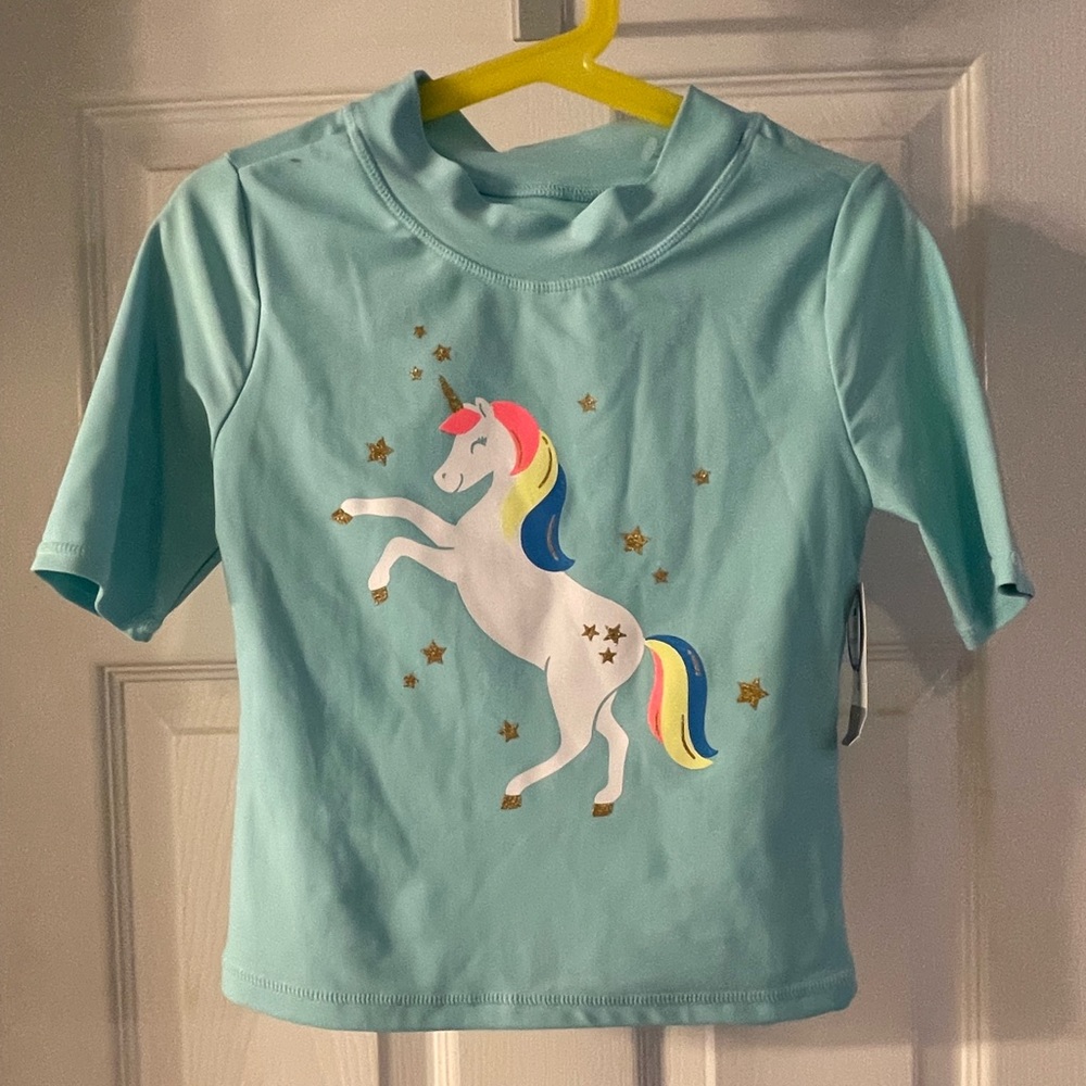 Carters blue unicorn short sleeve rash guard. Size 7